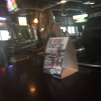 The Berwick Public House - a woman at a bar - Pubs Near Me - Calgary, Alberta The Berwick Public House - a woman at a bar - Pubs Near Me - Calgary, Alberta