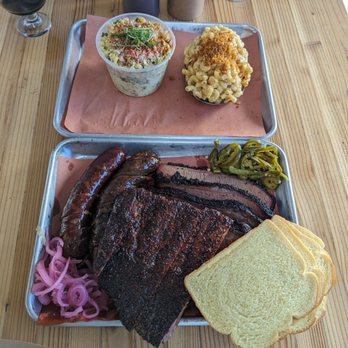 Moo's Craft Barbecue - Brisket pork ribs jalapeno & poblano queso Oaxaca sausages with Mac and cheese and corn esquites - Barbeque Near Me - Los Angeles, California