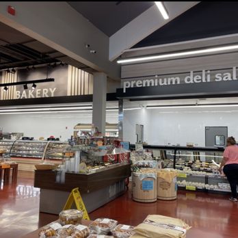 Angelo Caputo's Fresh Markets - The back of the store is now one long counter broken up by various departments- here is the Bakery and Deli. - Grocery Near Me - Bloomingdale, Illinois Angelo Caputo's Fresh Markets - The back of the store is now one long counter broken up by various departments- here is the Bakery and Deli. - Grocery Near Me - Bloomingdale, Illinois