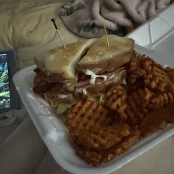 River City Grille - Monster Club sandwich with sweet potato waffle fries - American Near Me - Marble Falls, Texas River City Grille - Monster Club sandwich with sweet potato waffle fries - American Near Me - Marble Falls, Texas
