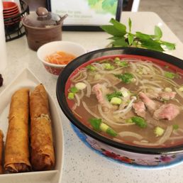 Egg rolls and small pho tai with tendon Egg rolls and small pho tai with tendon
