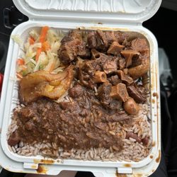 A Taste of Island Spice - Oxtail with rice and peas, cabbage, gravy, and plantain