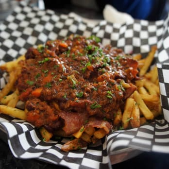 Holy Chuck - Holy Chuck fries ($5.99) with bacon, double cheese and topped with homemade vino chili - Burgers Near Me - Toronto, Ontario