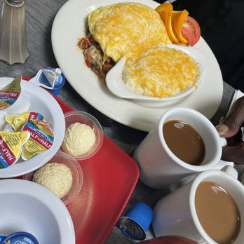 Flavor Table - The jambalaya omelette with cheese grits - Cajun/Creole Near Me - Los Angeles, California Flavor Table - The jambalaya omelette with cheese grits - Cajun/Creole Near Me - Los Angeles, California