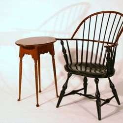 Lighthouse Woodworking - Windsor chair in ebony dye with Colonial spoon foot table in tiger maple.