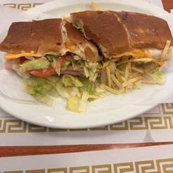 Ham & cheese with lettuce and tomato and papitas.