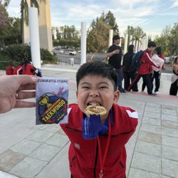 Sparks Taekwondo - Bite on his first gold medal