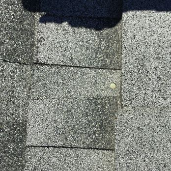 RC Roofing Co - Exposed nail in shingle - Roofing Near Me - Downey, California RC Roofing Co - Exposed nail in shingle - Roofing Near Me - Downey, California
