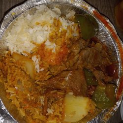 New China Chinese Restaurant - Pepper Steak with onions in a brown gravy with plenty of sauce for my White Rice.  Very good tasting