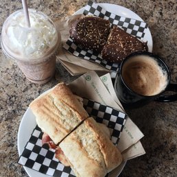 a sandwich and a cup of coffee a sandwich and a cup of coffee