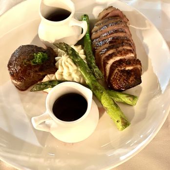 Stans Epicurean - Pan roasted duck breast, delicious mashed potatoes, outstanding asparagus, and the fillet was cooked perfectly! - New American Near Me - Redington Shores, Florida