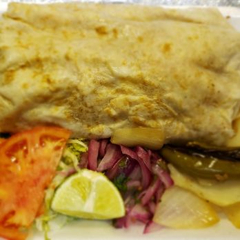 Azteca Taco Truck - The ground beef burrito, the Al Pastor is better. - Food Trucks Near Me - Milwaukee, Wisconsin Azteca Taco Truck - The ground beef burrito, the Al Pastor is better. - Food Trucks Near Me - Milwaukee, Wisconsin
