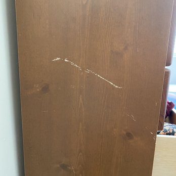 Blue Skies Movers - Long scratch on the side of wooden dresser; there are also several nicks on the edges - Movers Near Me
