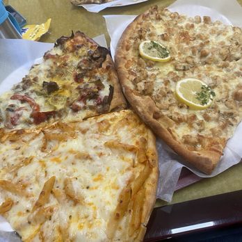 Pizzeria Bello - Left: Cheesesteak and Vodka Parm Top: Chicken Marsala  Right: Chicken Francese - Italian Near Me - Brookfield, Connecticut