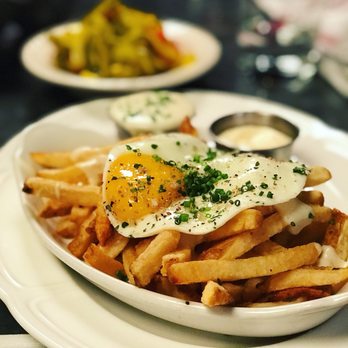 Au Cheval - Fries with egg - Bars Near Me - Chicago, Illinois Au Cheval - Fries with egg - Bars Near Me - Chicago, Illinois