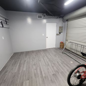 ZM Home Improvement - We converted this garage from storage to a beautiful usable room, painted the ceiling black the walls gray, then installed laminate flooring - General Contractors Near Me - Howell Township, New Jersey ZM Home Improvement - We converted this garage from storage to a beautiful usable room, painted the ceiling black the walls gray, then installed laminate flooring - General Contractors Near Me - Howell Township, New Jersey