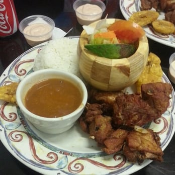 Sabor Latino - a plate of food on a table - Puerto Rican Near Me - Jacksonville, Florida Sabor Latino - a plate of food on a table - Puerto Rican Near Me - Jacksonville, Florida