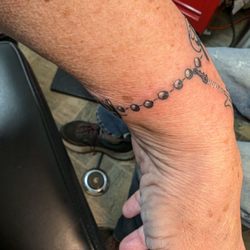I'm No Angel Tattoos - Wanda did the names as a charm bracelet.  This way if I want to add my son's children I can.  Awesome idea!