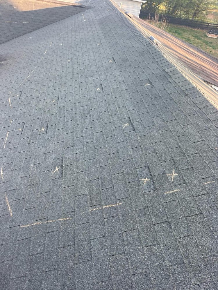 Slide of Avis Roofing Service