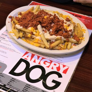 Angry Dog - HECTOR's Poutine ($9.95) North meets South(west) with our take on a Canadian classic. Fries, Cheddar cheese, chorizo and jalapeño gravy. - Bars Near Me - Dallas, Texas Angry Dog - HECTOR's Poutine ($9.95) North meets South(west) with our take on a Canadian classic. Fries, Cheddar cheese, chorizo and jalapeño gravy. - Bars Near Me - Dallas, Texas
