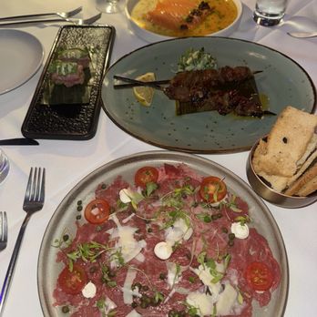 Jay's - Beef carpaccio, Lamb skewers, crispy rice and truffle salmon in the back - Steakhouses Near Me - Fort Lauderdale, Florida