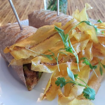 Nosh Creative Catering - Chicken, pepper jack cheese, pickled onion, roasted peppers,guacamole, salsa, with plantain chips. - Caterers Near Me - Hudson, Ohio Nosh Creative Catering - Chicken, pepper jack cheese, pickled onion, roasted peppers,guacamole, salsa, with plantain chips. - Caterers Near Me - Hudson, Ohio