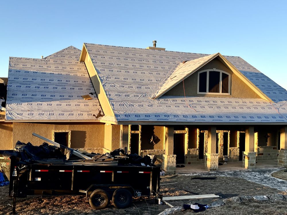 Slide of Wilson Roofing and Renovations