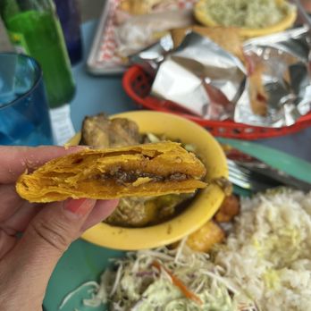 Francisco's Restaurant - Jamaican Beef Patties -flakey golden crust and perfectly seasoned with curry and heatz - Caribbean Near Me - Rochester, Minnesota