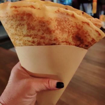 Columbia Gorge Crepes - a hand holding a cone of crepes - Food Trucks Near Me - Hood River, Oregon Columbia Gorge Crepes - a hand holding a cone of crepes - Food Trucks Near Me - Hood River, Oregon