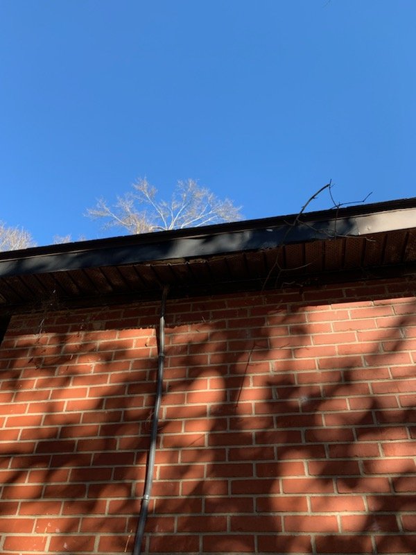 Slide of The Roofing Company