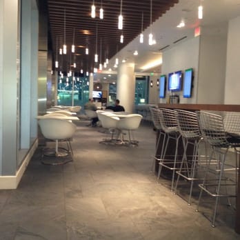 The Centurion Lounge - One part of the lounge near the bar and buffet bar - Airport Lounges Near Me - Dallas, Texas