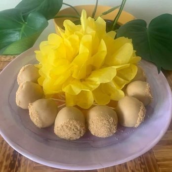 Gorda Bakes - Banana cake pops with a cream cheese filling, peanut butter coating and crush nutter butters. - Desserts Near Me