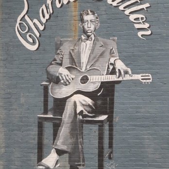 Main Street murals - King of the Delta Blues (Charlie Patton) by Charles Guess (2011) at 901 E Main St (side of building) - Public Art Near Me - Richmond, Indiana Main Street murals - King of the Delta Blues (Charlie Patton) by Charles Guess (2011) at 901 E Main St (side of building) - Public Art Near Me - Richmond, Indiana