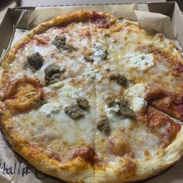 Meatball pizza ?  Looks more like cheese pizza.