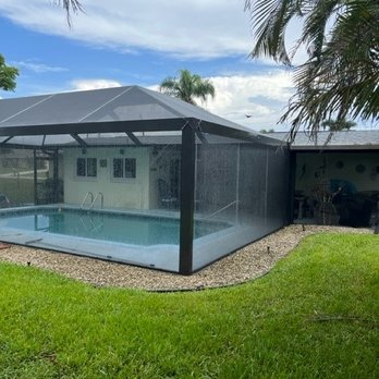 Topla - Screen Enclosures / Aluminum Design - Our new lanai cage Topla built after Hurricane Ian - Patio Coverings Near Me - Fort Myers, Florida Topla - Screen Enclosures / Aluminum Design - Our new lanai cage Topla built after Hurricane Ian - Patio Coverings Near Me - Fort Myers, Florida