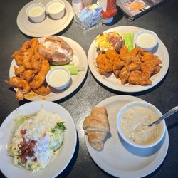 2- chicken tender platters with a bowl of potato soup and a house salad