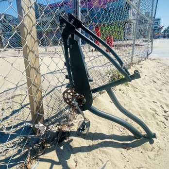 Venice Beach Boardwalk - Venice Beach 2023 - they stole all the parts to the bike - Beaches Near Me - Venice, California