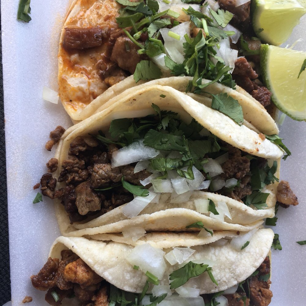 Barbacoa, adovado and asada tacos.
