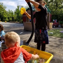 Little Acorn Day School & Sprouts - Outdoor water play!