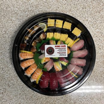 Domo Cafe Kahala - Rainbow Sushi Platter - Tamago, Unagi, Ebi, Ahi, and Hamachi Nigiris, Rainbow Roll in the middle - Sushi Bars Near Me - Honolulu, Hawaii