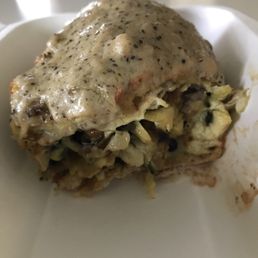 Breakfast burrito in takeout box