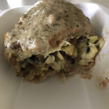 Everybody's Cafe - Breakfast burrito in takeout box - Cafes Near Me - Fairfield, Iowa
