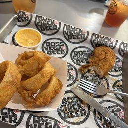 The Tupac with onion rings and garlic parm sauce.