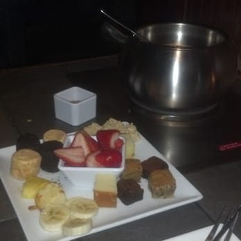 The Melting Pot - Towson - The Flaming Turtle dessert with various sweet dipping items - Fondue Near Me - Towson, Maryland The Melting Pot - Towson - The Flaming Turtle dessert with various sweet dipping items - Fondue Near Me - Towson, Maryland