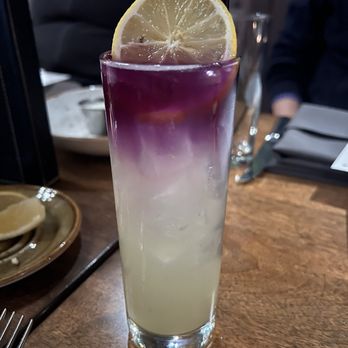 Millwright's - Lavender Haze mocktail; pineapple, lavender, lemon, butterfly pea flower with an added shot of grey goose - New American Near Me - Simsbury, Connecticut Millwright's - Lavender Haze mocktail; pineapple, lavender, lemon, butterfly pea flower with an added shot of grey goose - New American Near Me - Simsbury, Connecticut