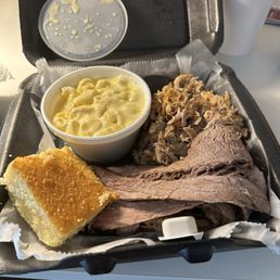 Brisket and pulled pork, Mac n cheese and cornbread. Brisket and pulled pork, Mac n cheese and cornbread.
