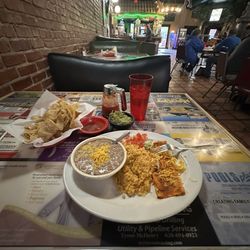Anchor Inn Mexican Restaurant - One Cheese Enchilada, beans, rice chips and guacamole in a  charming setting!