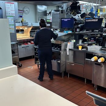 McDonald's - a man working in a restaurant kitchen - Fast Food Near Me - Irwindale, California