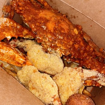 DaDam Crab - 6 shrimp with fries and 2 hush puppies. Best hush puppies! All really good and juicy! Hella fantastic n prices ain't bad. $8 blue crabs! - Seafood Near Me - Houston, Texas