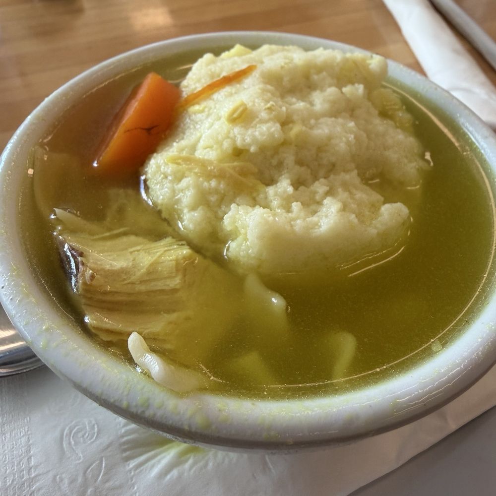 Bagel Bar East - Matzoh ball chicken noodle soup (1/2 Sandwich, Cup of Soup) - Bagels Near Me - North Miami, Florida Bagel Bar East - Matzoh ball chicken noodle soup (1/2 Sandwich, Cup of Soup) - Bagels Near Me - North Miami, Florida